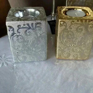 New tea  light ceramic candle holder. 2/25$